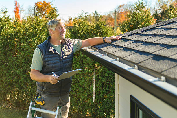 Professional Storm Damage Roof Repair technician working in Ecorse, MI